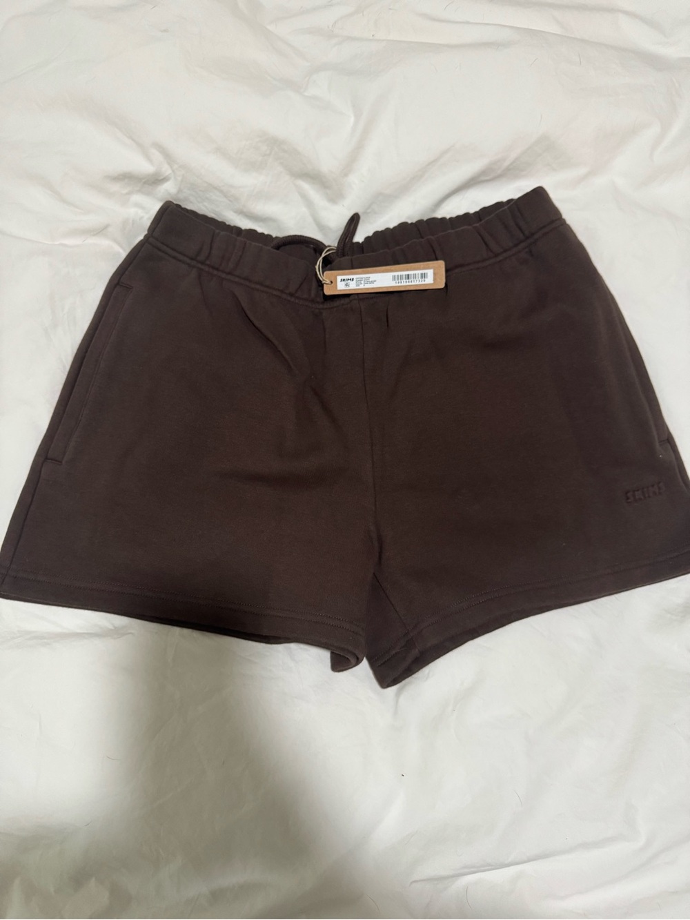 NWT SKIMS cotton fleece short in dark sepia